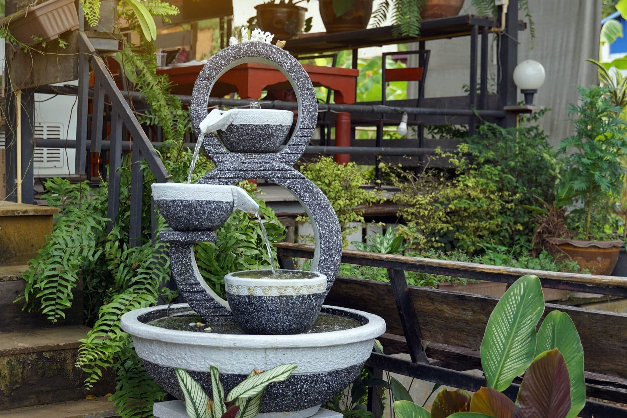 A set of overflowing water in the shape of a number 8, used to decorate a garden according to Feng Shui principles.jpg